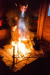 Lamu cooking pancakes in the hut at lunchtime
